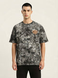 Distressed Acid-Wash Oversized Tee with Dripping Logo